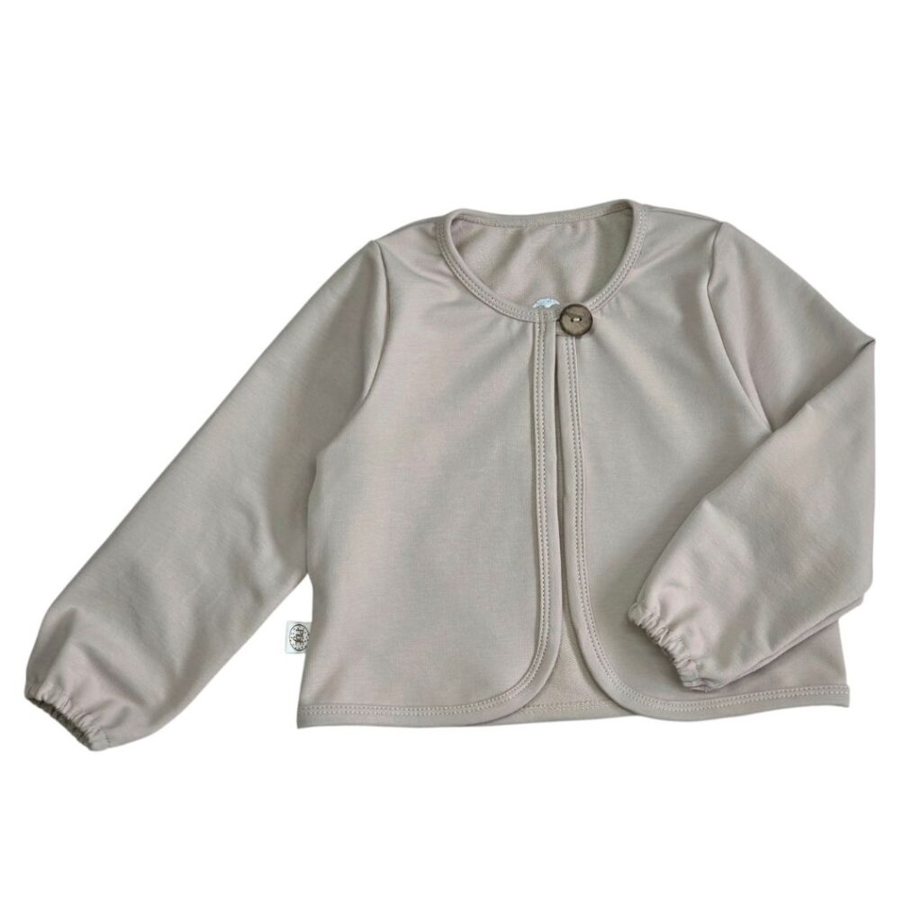 Beige meisjesvestje van French Terry met kokos knoop